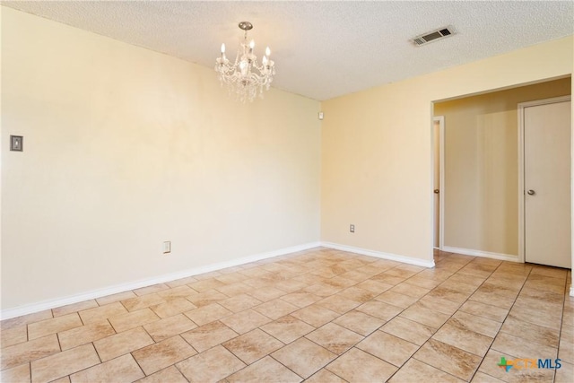 4409 Beach Ball Dr, Killeen, TX 76549 - empty room featuring a chandelier and a textured ceiling