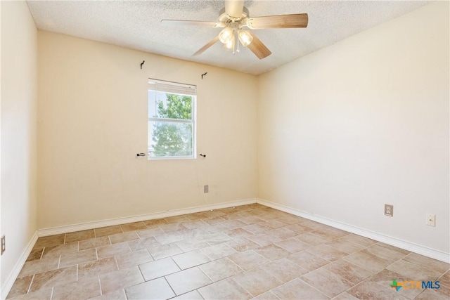 4409 Beach Ball Dr, Killeen, TX 76549 - empty room featuring a ceiling fan, a textured ceiling, and baseboards