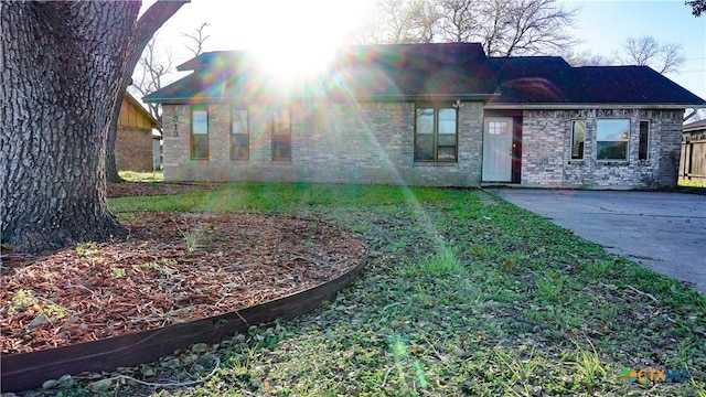 view of front of house featuring brick siding