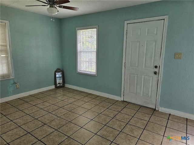 703 Atkinson Ave, Killeen, TX 76541 - spare room with ceiling fan and light tile patterned flooring