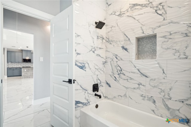 bathroom featuring washtub / shower combination