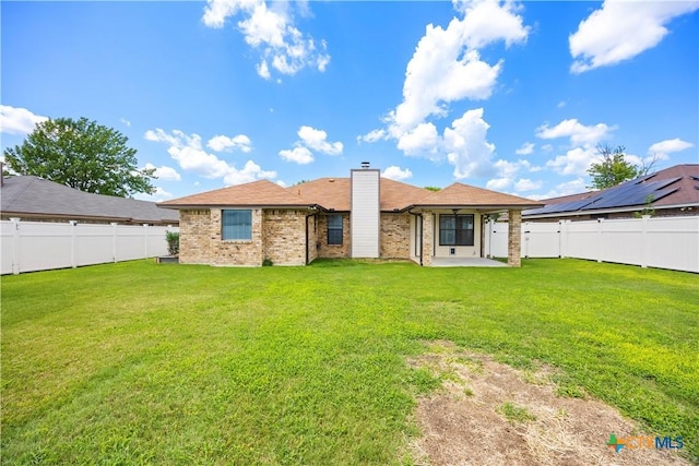 4408 Frontier Trl, Killeen, TX 76542 - rear view of house featuring a patio area, a chimney, a fenced backyard, and brick siding