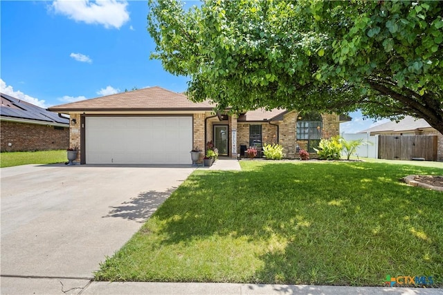 4408 Frontier Trl, Killeen, TX 76542 - view of front of property featuring an attached garage, concrete driveway, and brick siding