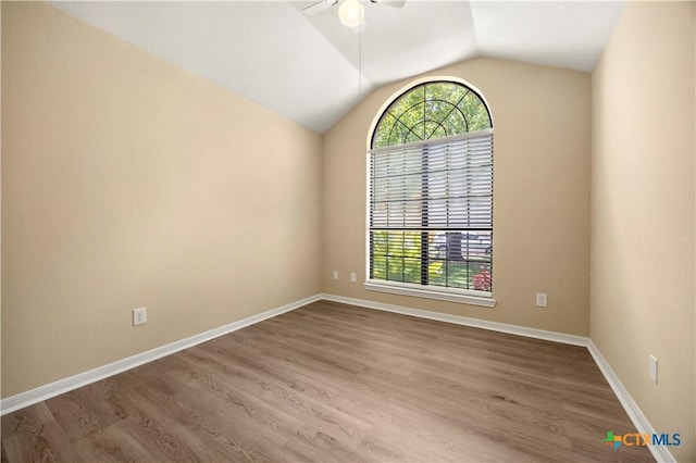 4408 Frontier Trl, Killeen, TX 76542 - spare room with plenty of natural light, ceiling fan, lofted ceiling, and wood finished floors