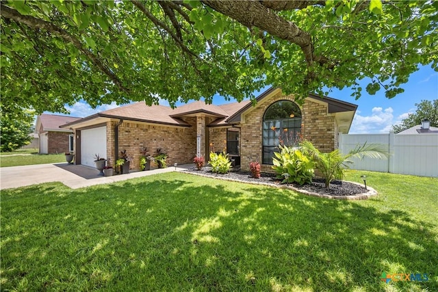 4408 Frontier Trl, Killeen, TX 76542 - ranch-style house with brick siding, driveway, and an attached garage