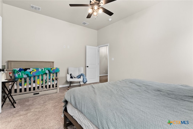 carpeted bedroom with ceiling fan