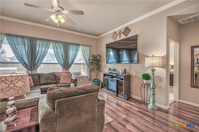 living room with ceiling fan, hardwood / wood-style floors, and ornamental molding