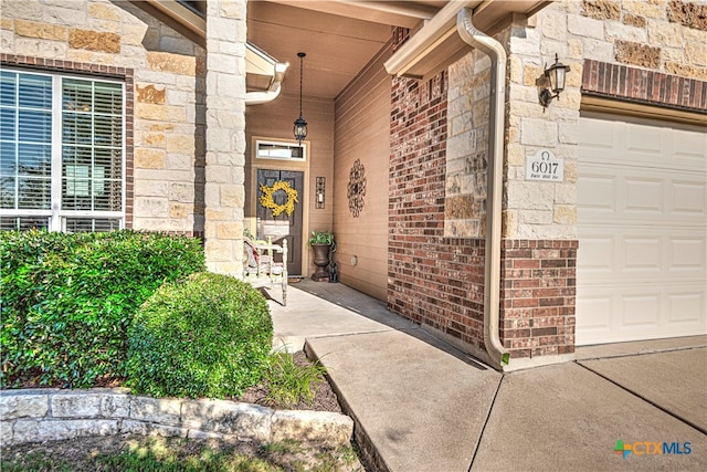 entrance to property featuring a garage