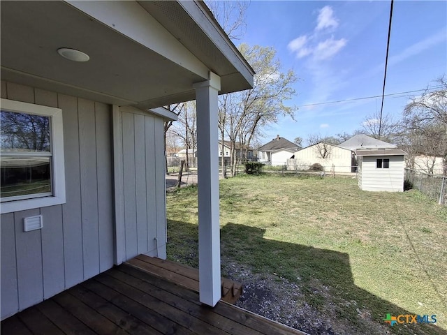 512 S 13th St, Temple, TX 76504 - view of yard featuring an outdoor structure, a storage unit, and fence