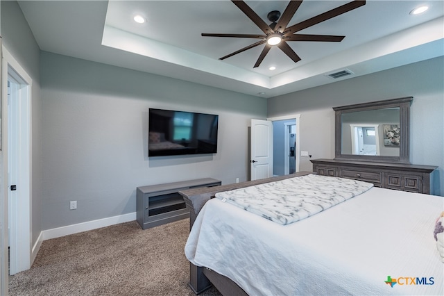 200 Wood Cv, Georgetown, TX 78633 - carpeted bedroom with a raised ceiling, recessed lighting, baseboards, and ceiling fan
