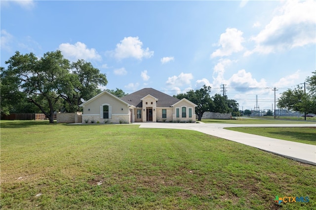 200 Wood Cv, Georgetown, TX 78633 - ranch-style house featuring stone siding and driveway