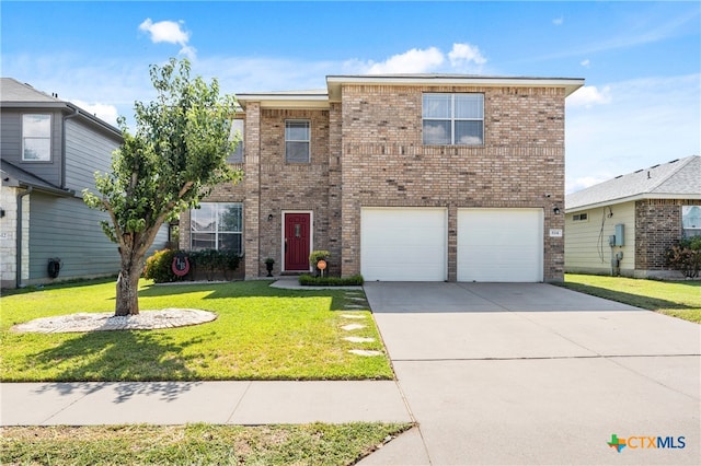 view of front property featuring a garage and a front lawn