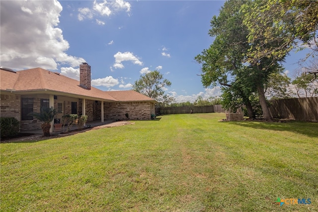 view of yard with a patio area