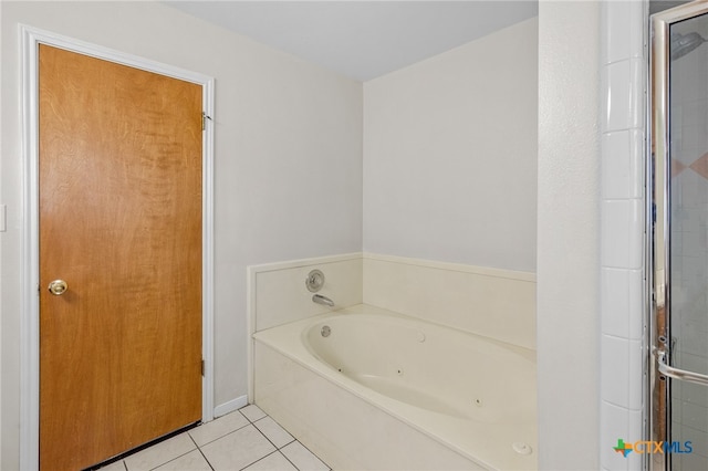 bathroom with plus walk in shower and tile patterned flooring