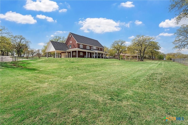 view of yard featuring fence