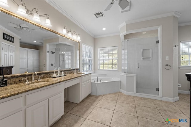 bathroom featuring visible vents, ceiling fan, and a sink