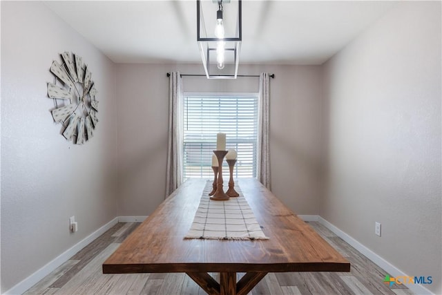 unfurnished dining area featuring light hardwood / wood-style floors