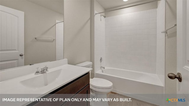 full bathroom featuring vanity, tiled shower / bath combo, and toilet