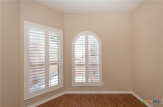 1935 Grandview Dr, Salado, TX 76571 - empty room featuring wood finished floors and plenty of natural light