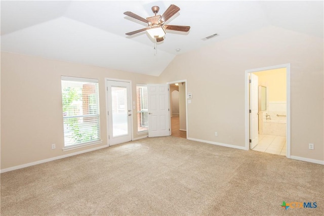 1935 Grandview Dr, Salado, TX 76571 - unfurnished bedroom with lofted ceiling, access to exterior, light colored carpet, ensuite bath, and a ceiling fan