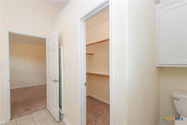 1935 Grandview Dr, Salado, TX 76571 - bathroom with tile patterned flooring and a spacious closet