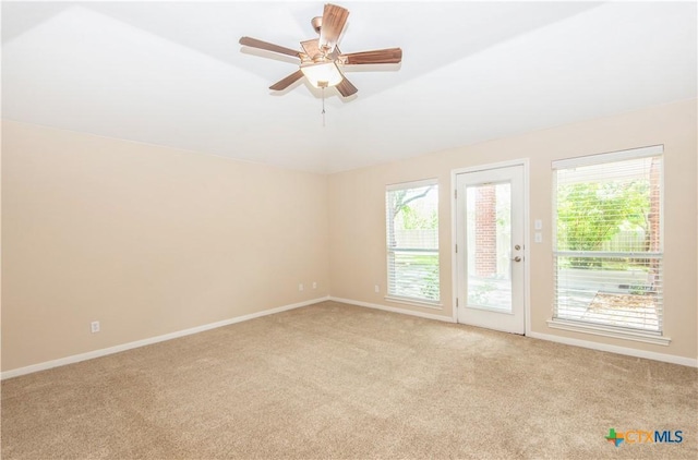 1935 Grandview Dr, Salado, TX 76571 - unfurnished room featuring light carpet, a ceiling fan, and vaulted ceiling