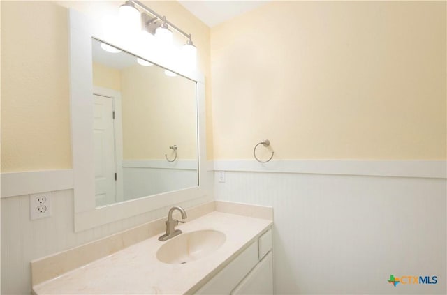 1935 Grandview Dr, Salado, TX 76571 - bathroom featuring a wainscoted wall and vanity