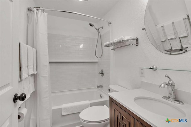 full bath featuring toilet, vanity, and shower / bathtub combination with curtain