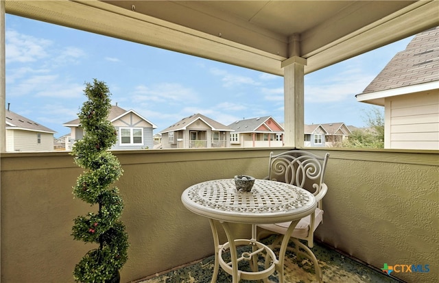 balcony featuring a residential view