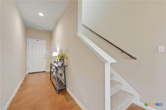 stairs featuring recessed lighting, carpet flooring, visible vents, and baseboards