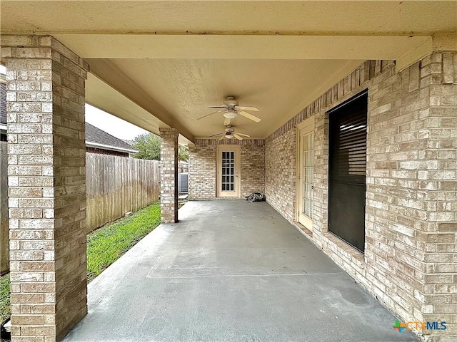 view of patio featuring ceiling fan