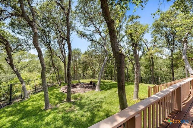 view of yard featuring a wooden deck