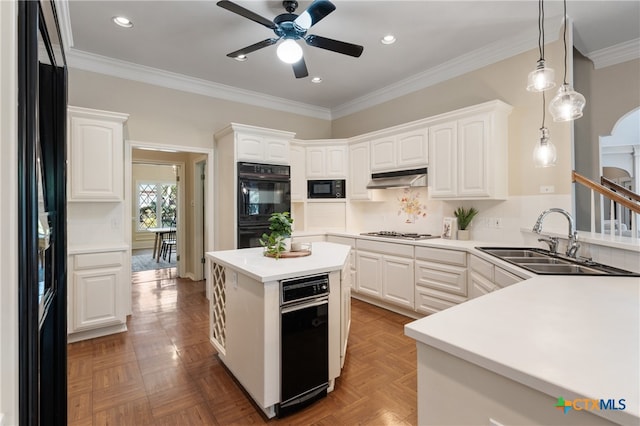 kitchen with white cabinets, ornamental molding, black appliances, and sink