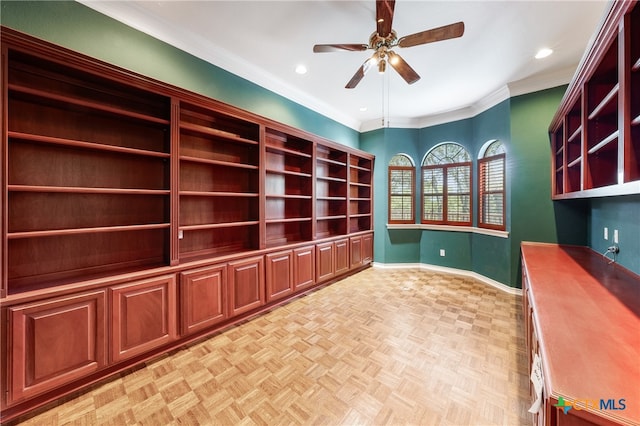 unfurnished office featuring crown molding, ceiling fan, and light parquet floors