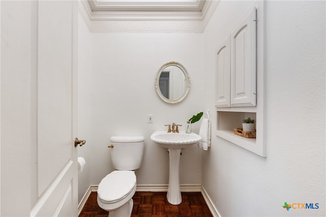 bathroom featuring sink and toilet