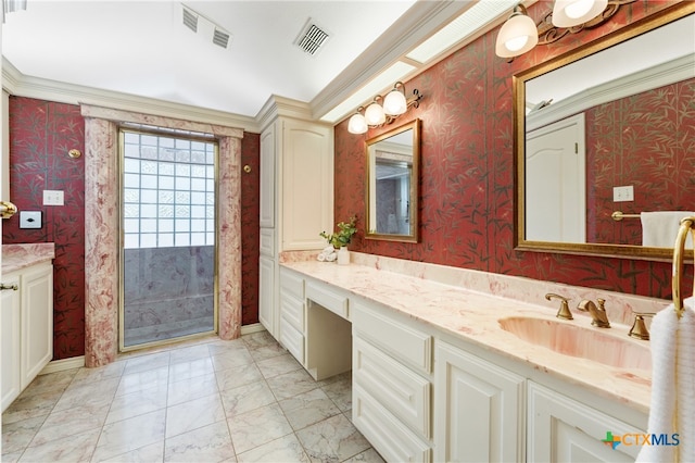 bathroom with vanity and ornamental molding