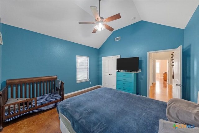 bedroom with high vaulted ceiling, a ceiling fan, multiple windows, and visible vents