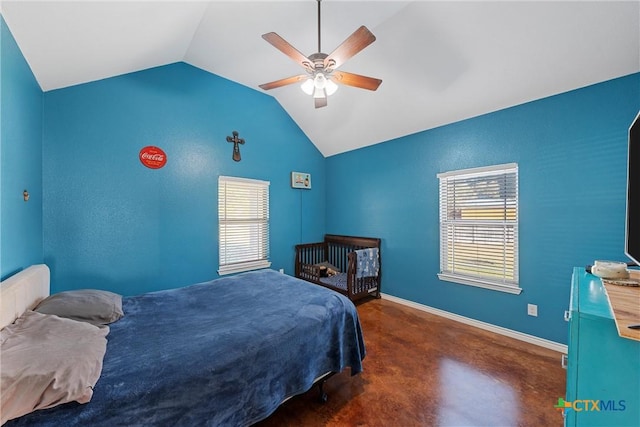 bedroom with lofted ceiling, a ceiling fan, finished concrete floors, and multiple windows