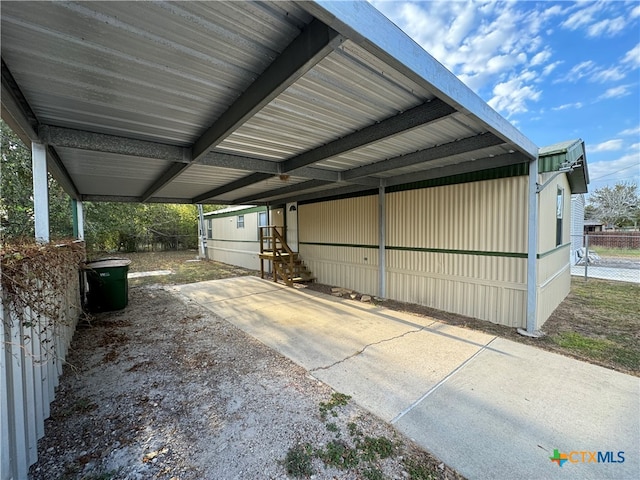 exterior space featuring a carport