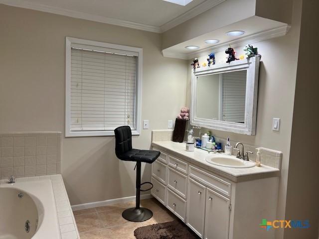 bathroom with vanity, tile patterned flooring, ornamental molding, and tiled bath