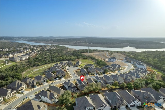 aerial view with a residential view and a water view