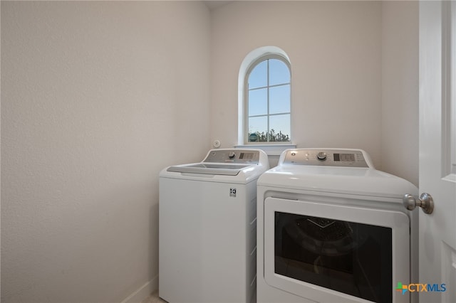 laundry area with washer and dryer and laundry area