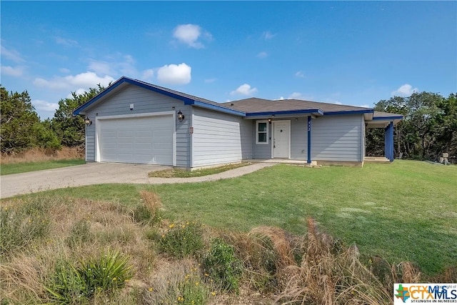 ranch-style home with a front yard and a garage