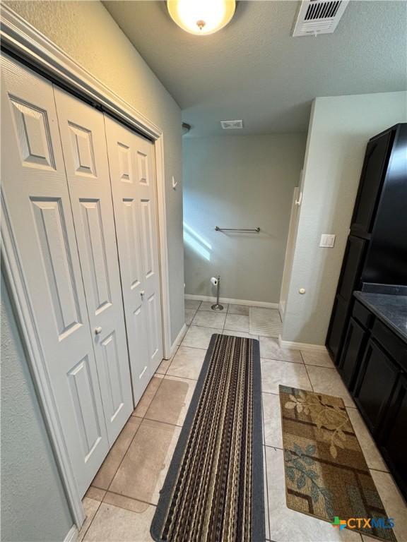 bathroom with tile patterned flooring