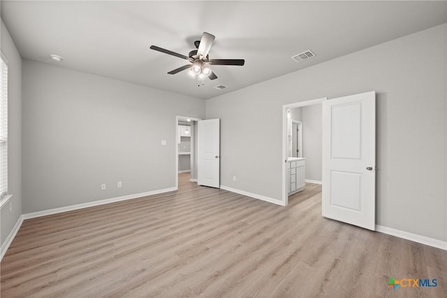 704 Seven Springs Dr, Temple, TX 76502 - unfurnished bedroom with light wood-style floors, baseboards, and visible vents