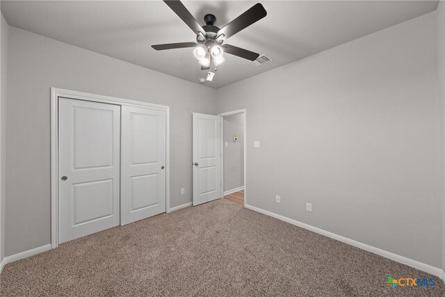 704 Seven Springs Dr, Temple, TX 76502 - unfurnished bedroom with a closet, baseboards, visible vents, and carpet floors