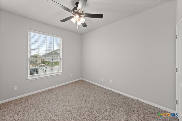 704 Seven Springs Dr, Temple, TX 76502 - empty room with carpet, baseboards, and a ceiling fan