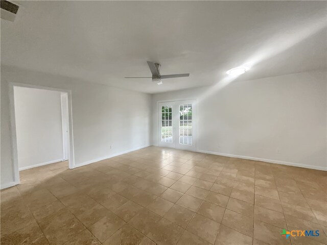 empty room featuring ceiling fan