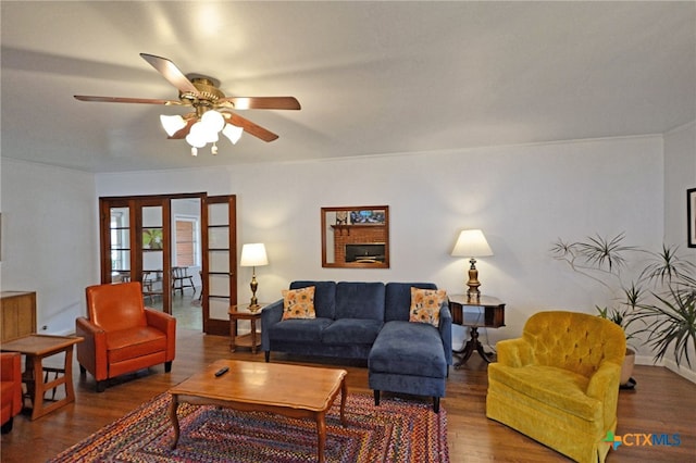 929 E Cedar St, Seguin, TX 78155 - living area with wood finished floors, ceiling fan, and french doors