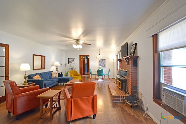 929 E Cedar St, Seguin, TX 78155 - living area featuring dark wood-style floors, ceiling fan, and a brick fireplace